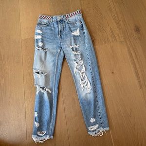 Distressed blue jeans